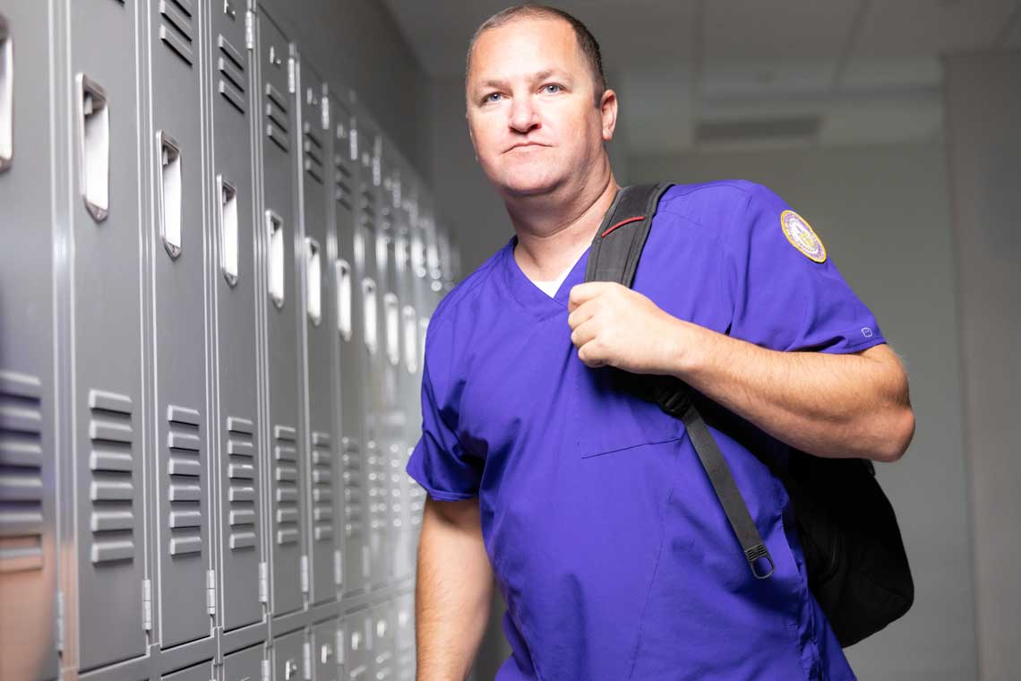 CTX nursing student standing near lockers