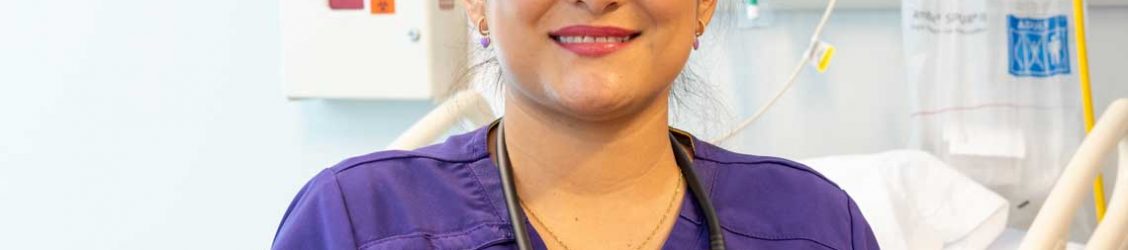 CTX nursing student smiling in sim lab