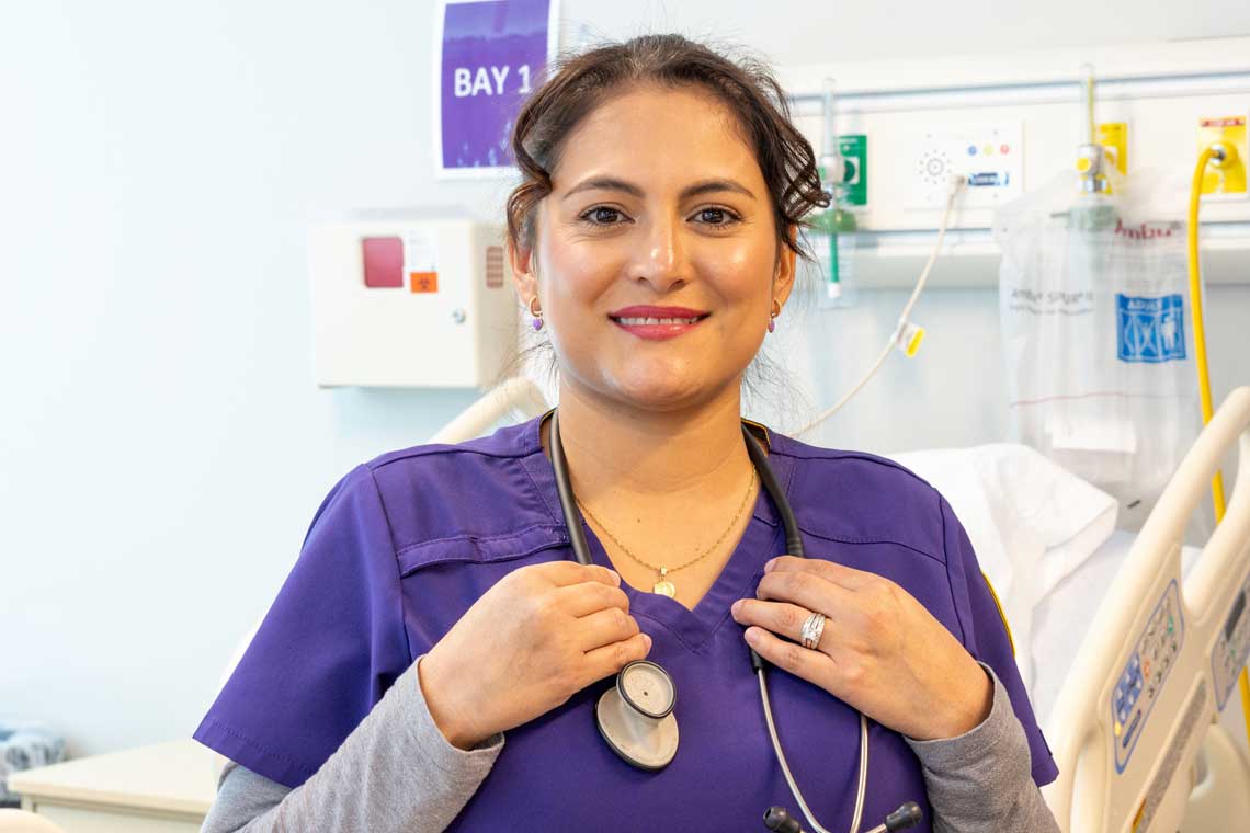 CTX nursing student smiling in sim lab