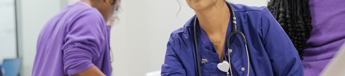 Nursing student in a sims lab